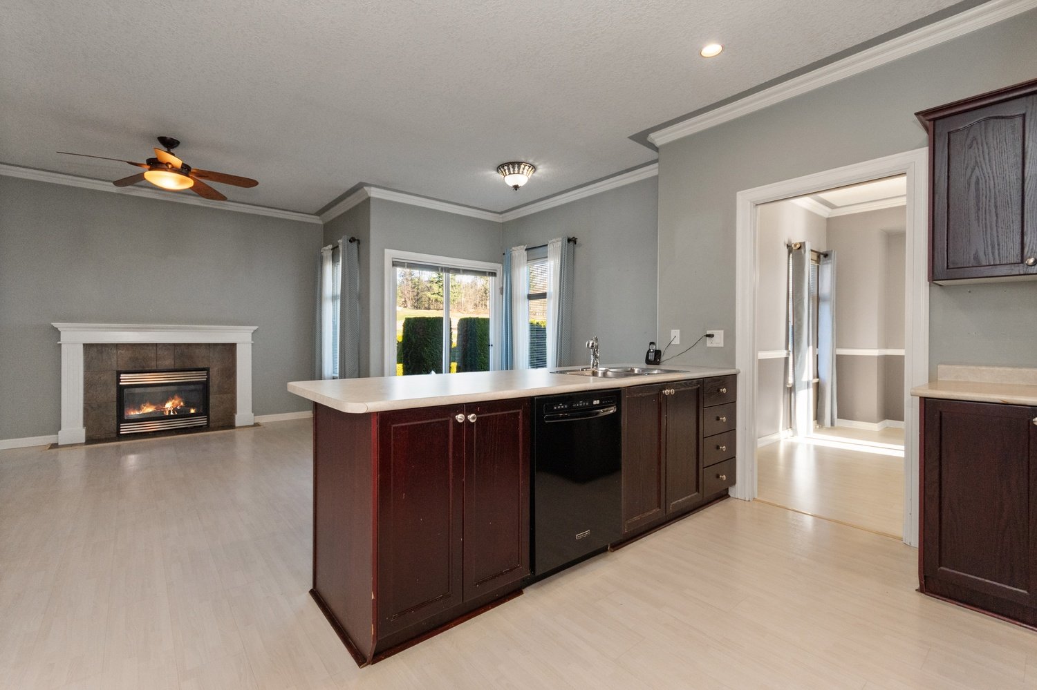 Kitchen & Family Room with Fenced Patio Access Kitchen & Family Room with Fenced Patio Access